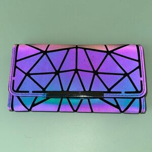 Beautiful reflective wallet. Never been used.